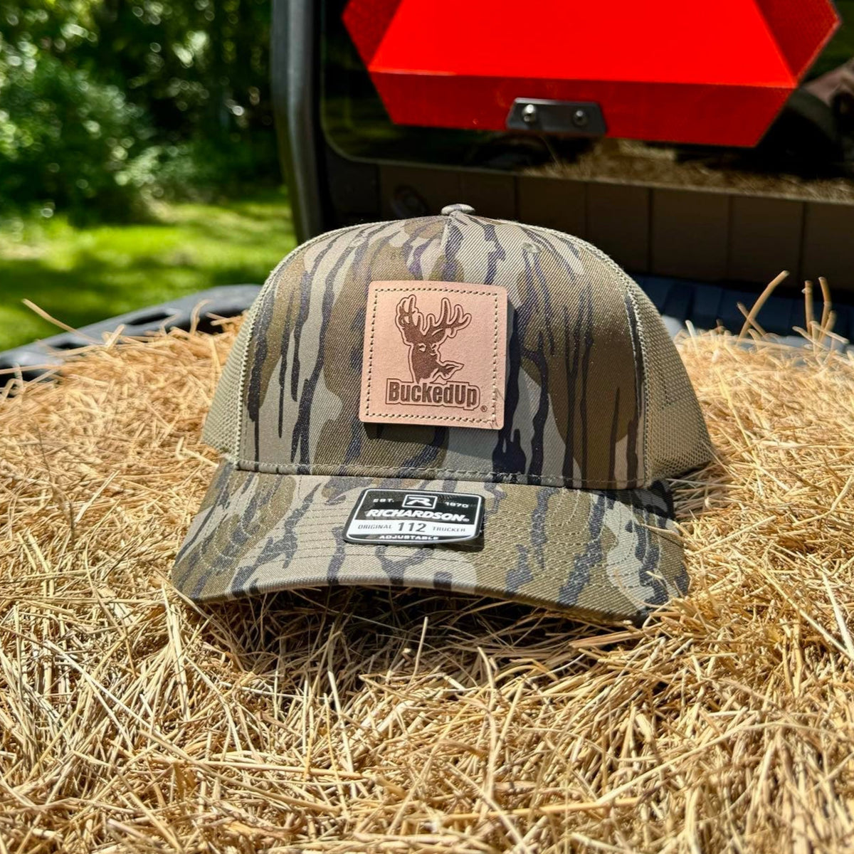 BuckedUp® Leather Patch Mossy Oak Bottomland with Green Mesh Snapback