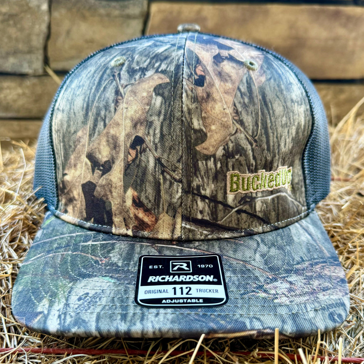 BuckedUp® Text in Mossy Oak Camo and Black Mesh Snapback