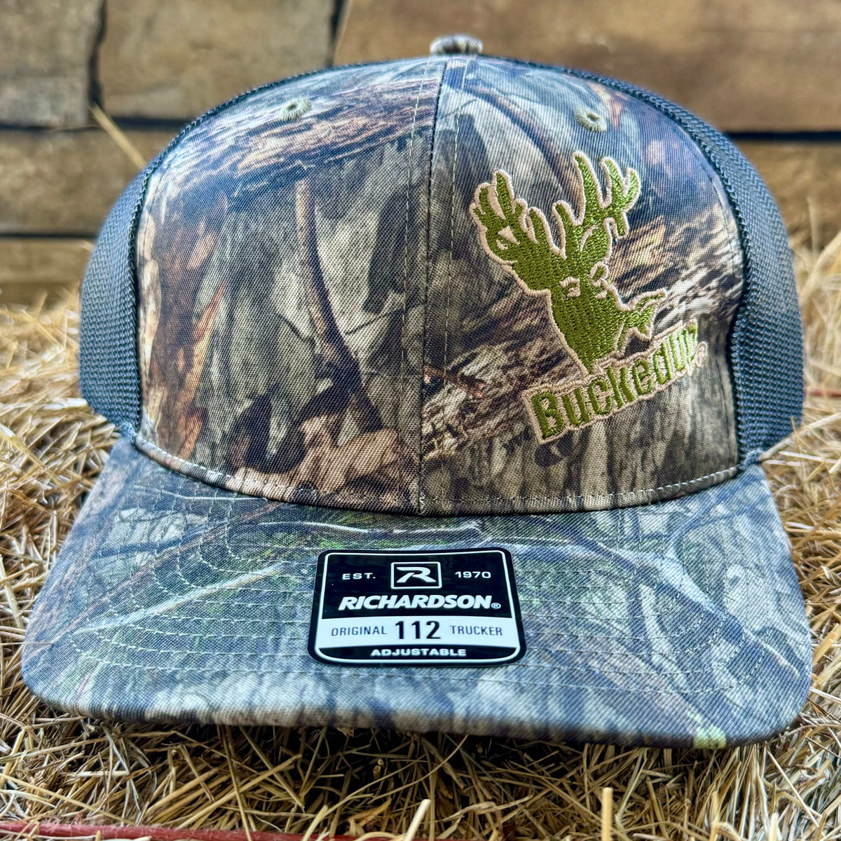 BuckedUp® Logo in Mossy Oak Camo and Black Mesh Snapback