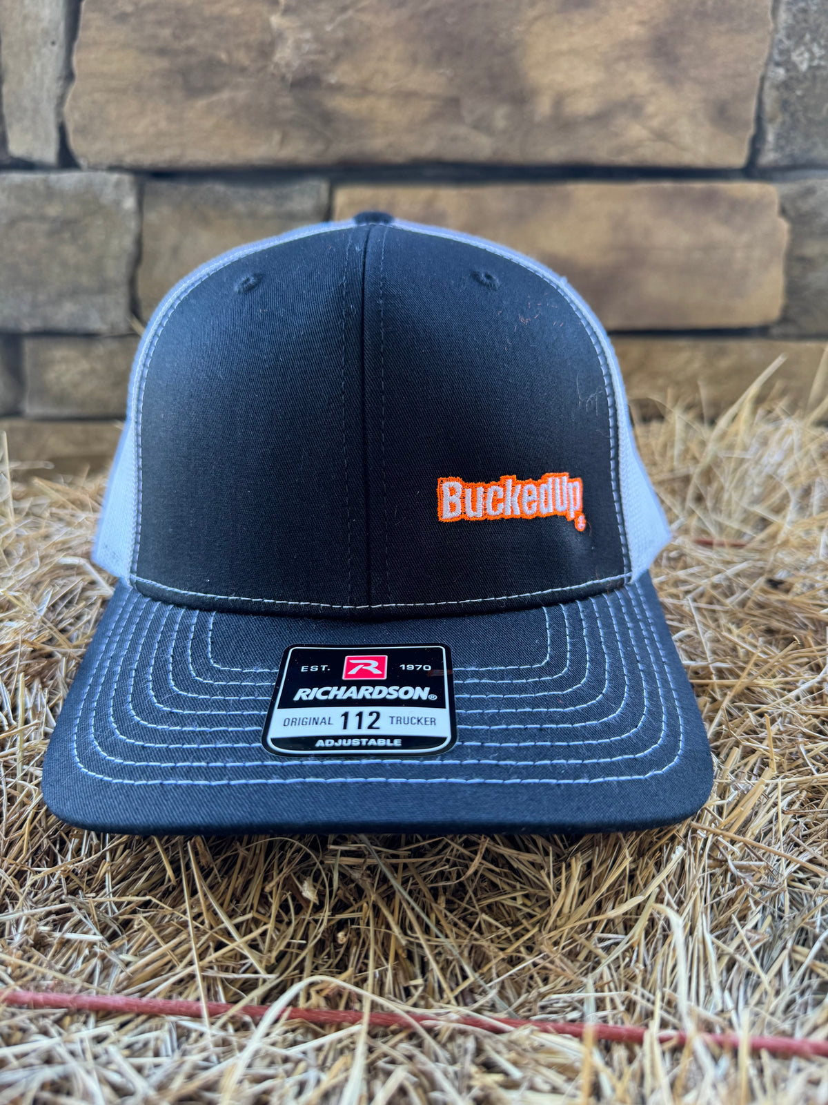 BuckedUp® Orange Text Black with White Mesh Snapback