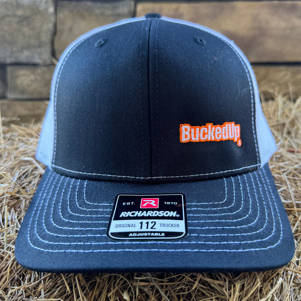 BuckedUp® Orange Text Black with White Mesh Snapback